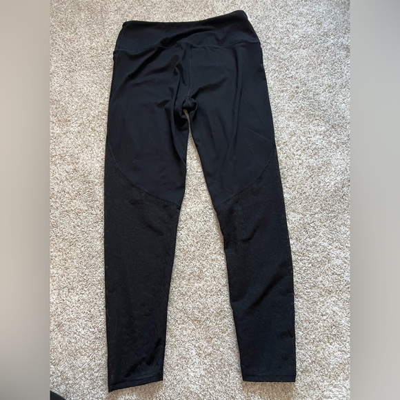 Victoria’s Secret black leggings with mesh leopard print bottoms. - Picture 2 of 4